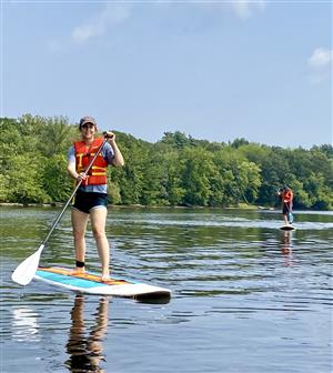 SUP lady on a paddle board 